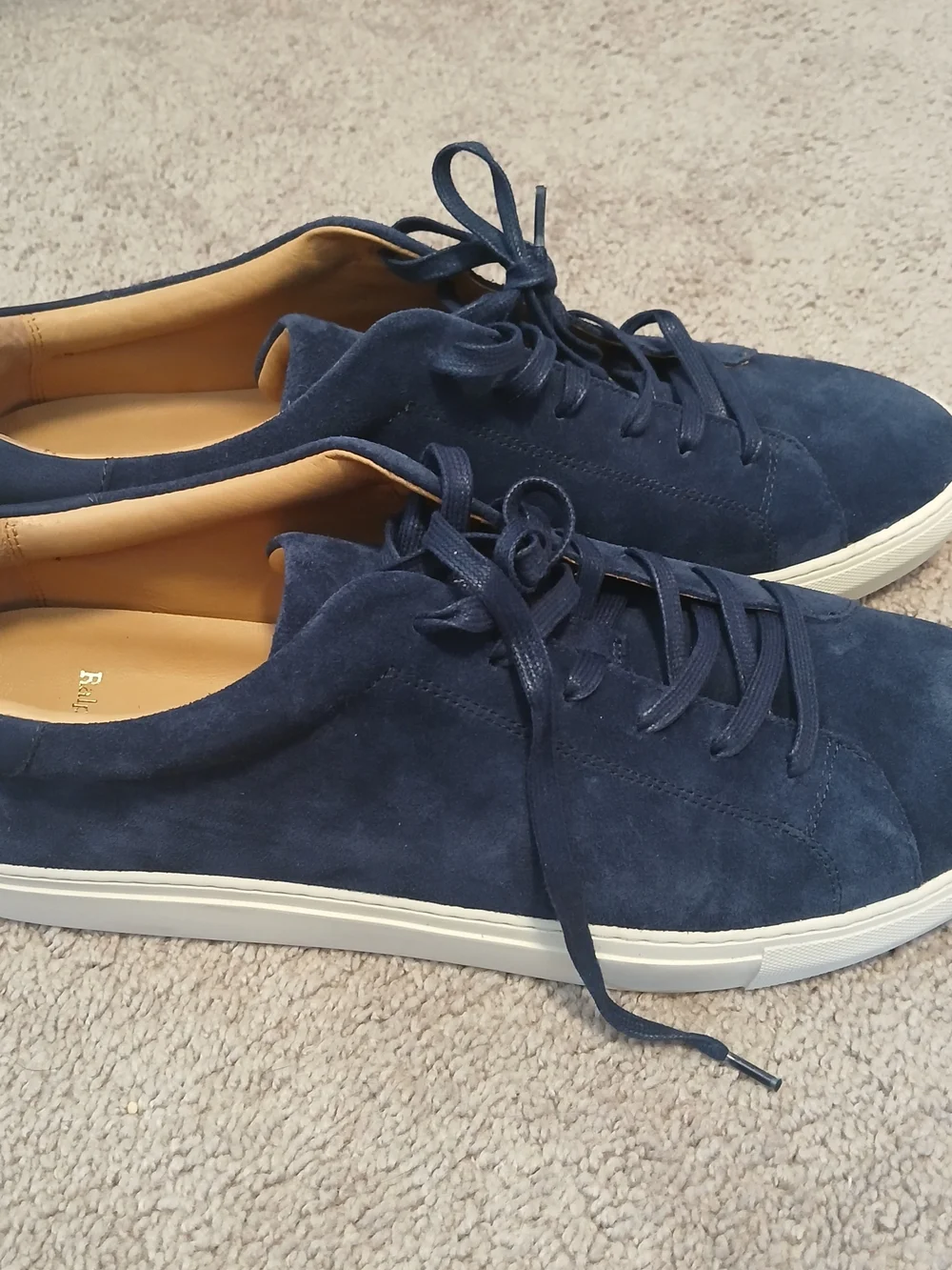 Polo Ralph Lauren Jermain sneakers feature a streamlined silhouette in navy blue